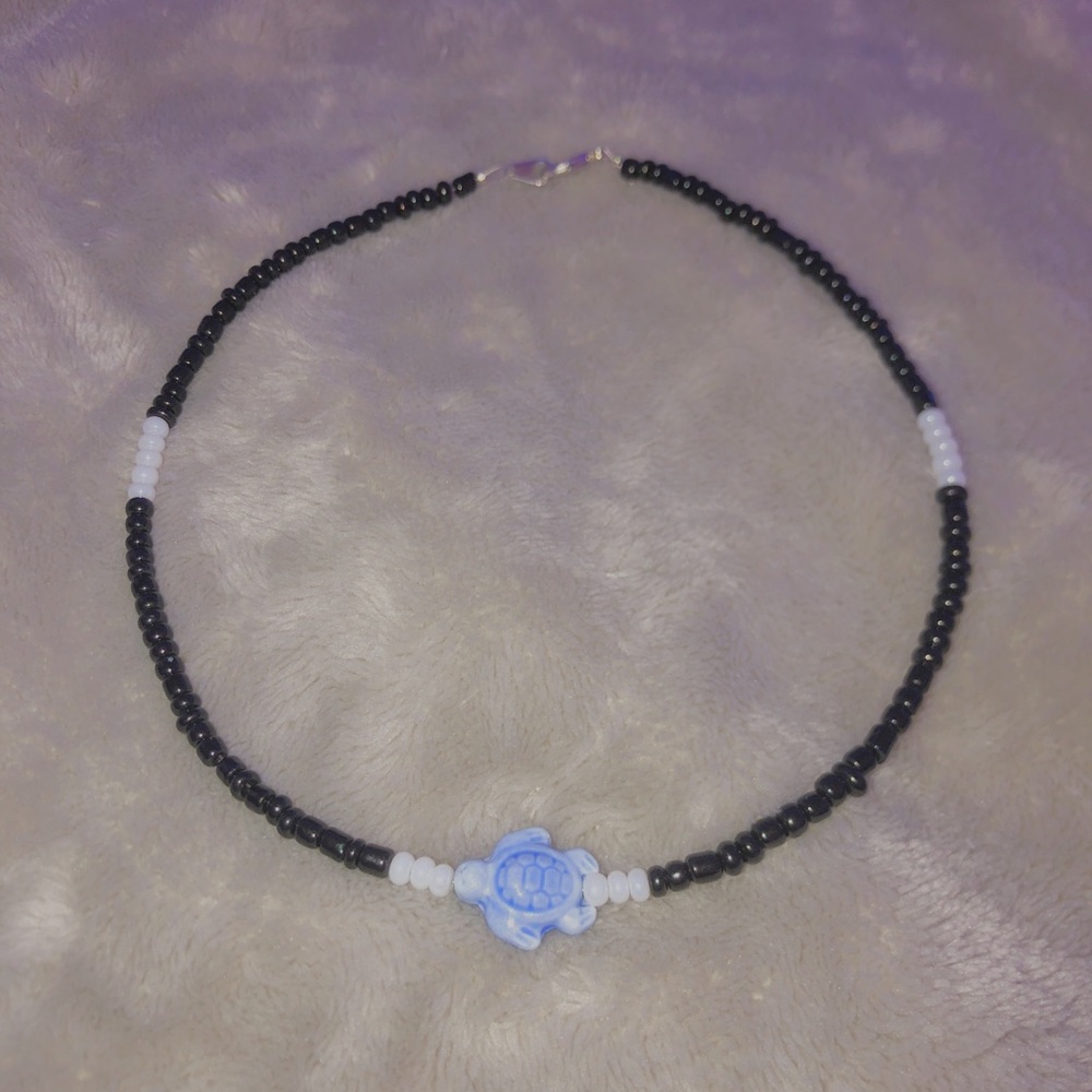 black and white turtle necklace